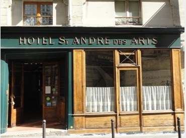 Our hotel: not fancy, no elevator, no TV, no AC.  Choose it for friendliness, character, price, and location