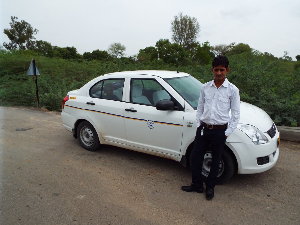 Ashok, our driver and constant companion with his immaculate car.
